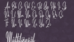Yustin - Script Font